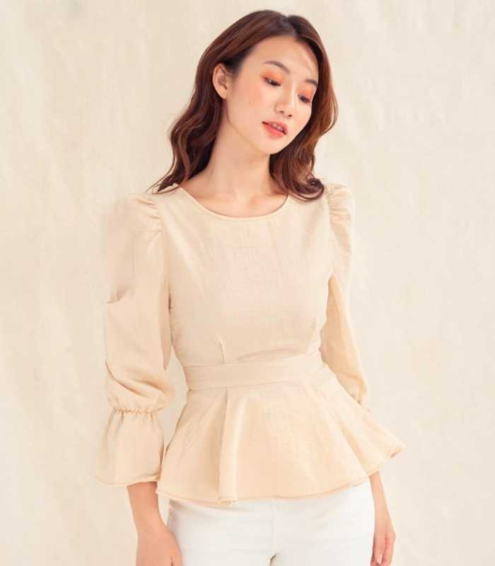 Những chiếc áo peplum là item giúp chị em giấu dáng hiệu quả