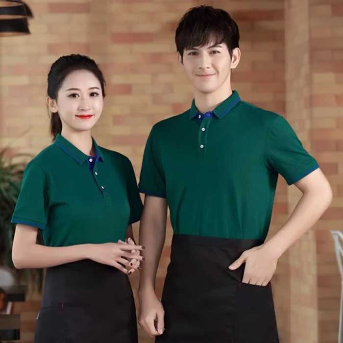 Áo thun đồng phục nhân viên màu xanh thẫm hài hòa được may bởi xưởng Saigon Uniform