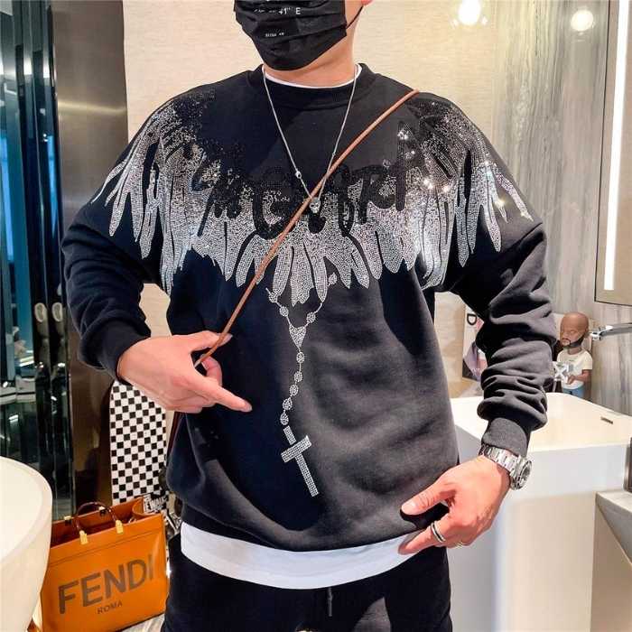 Mẫu áo sweater cánh chim phượng lấp lánh quý phái